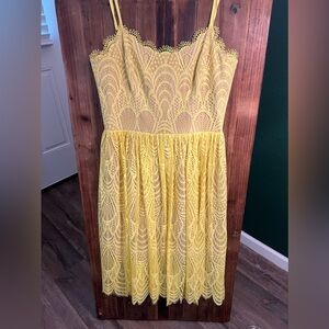 Brand new, bright yellow, midi lace, spaghetti strap dress from Dillards.